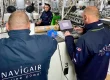 Two Navigair employees working on engine maintenance, performing an engine survey on a superyacht.
