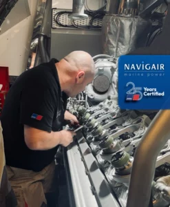 A Navigair technician working on mtu yacht engines.