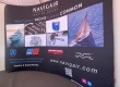 Navigair's banner at Cannes Yachting Festival showing the logo of all their partners.