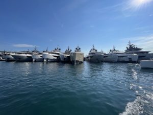 A row of 8 yachts docked at the CYF.