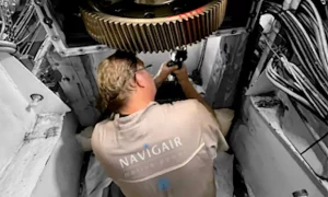 One of Navigair's workers servicing a ZF